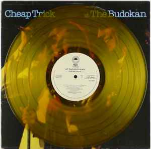 Image of Label Cover of 2944229S: 12" - CHEAP TRICK, At The Budokan (Epic; S EPC 86083, UK 1978, Hype Stickered Sleeve, Booklet, Transparent Gold/Yellow Vinyl) Light edge wear, feint ring wear, booklet and vinyl are very clean  VG/VG+