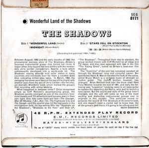 Image of Back Cover of 2914395C: 7" - THE SHADOWS, Wonderful Land Of The Shadows (Columbia Blue/Black; SEG 8171, UK 1962, Laminated Flipback Sleeve, Repress. Release Dates On Both Labels) Date stamped and track times written on rear of sleeve.  VG/VG+