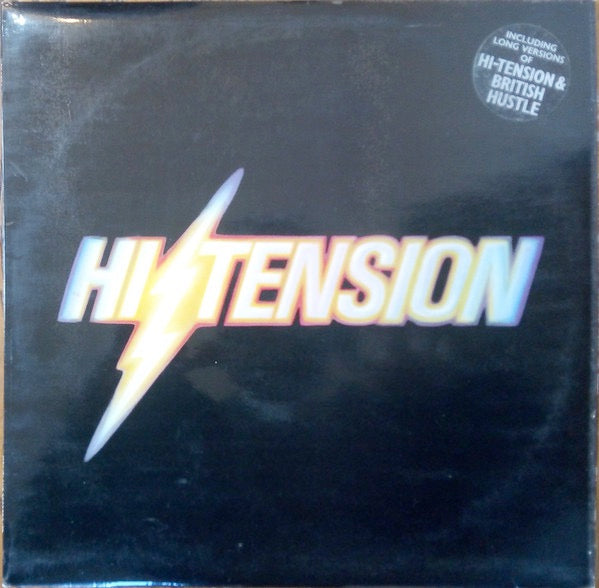 Image of Front Cover of 3114387C: LP - HI-TENSION, Hi-Tension (Island Records; ILPS 9564, UK 1978, Laminated Sleeve, Inner, Poster) Hype sticker on sleeve faded / worn. Sleeve itself has some wear and scuffs, with dirt along front opening where laminate ends. Inner has edge wear and poster has a corner ripped off. Comes with T-shirt offer flyer  VG/VG