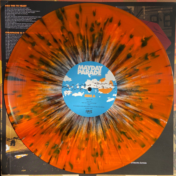 Image of Label of 3544079S: LP - MAYDAY PARADE, A Lesson In Romantics (Fearless Records; FRL 39099-1, US 2015, Orange with black & white splatter) Strong VG+  VG+/VG+