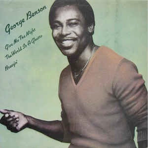 Image of Front Cover of 12" - VG/G+ - GEORGE BENSON, Give Me The Night / The World Is A Ghetto / Breezin' (Warner Bros; LV 40, UK 1980, Picture Sleeve), Sleeve has sticker ghost and light staining on it,  - 3216428C
