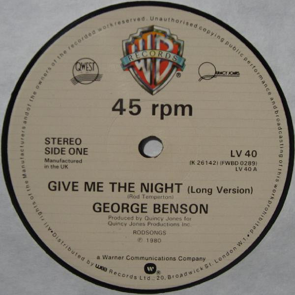 Image of Label Cover of 12" - VG/G+ - GEORGE BENSON, Give Me The Night / The World Is A Ghetto / Breezin' (Warner Bros; LV 40, UK 1980, Picture Sleeve), Sleeve has sticker ghost and light staining on it,  - 3216428C