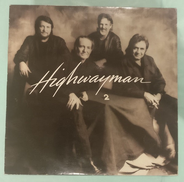 Image of Front Cover of LP - G+/G+ - WAYLON JENNINGS, WILLIE NELSON, JOHNNY CASH, KRIS KRISTOFFERSON, Highwayman 2 (CBS; 466652 1, UK 1990), Sleeve intact but worn, gold promo stamped. Plays with background noise on the run-ins/quiet bits.,  - 3016217C