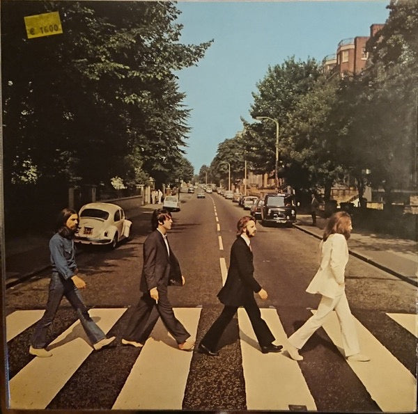 Image of Front Cover of LP - VG/VG - THE BEATLES, Abbey Road (Apple Records; PCS 7088, UK Reissue, DMM (Direct Metal Mastering)), Light hairlines. Does not have correct sleeve so have included an Abbey Road sleeve from previous pre-barcode pressing. , Light hairlines. Does not have correct sleeve so have included an Abbey Road sleeve from previous pre-barcode pressing.  - 3326237E