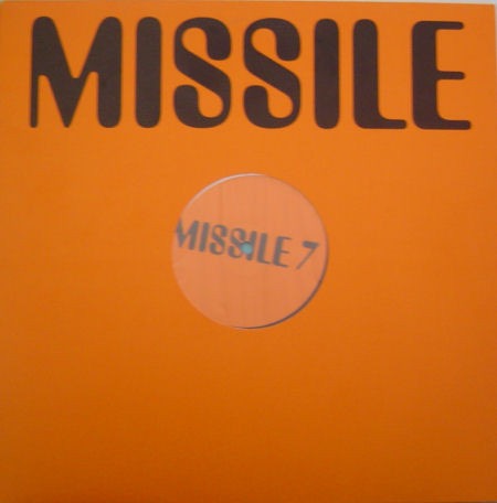 Image of Label Cover of 12" EP - G/VG - TIM TAYLOR & DAN ZAMANI, The Horn Track (Missile Records ; Missile 7, UK 1995, Company Sleeve), Sleeve damaged and coming away at bottom edge / corner. Top edge also split and worn,  - 1416500C