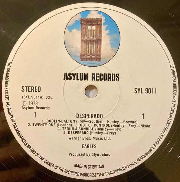 Image of Label Cover of LP - G/VG - EAGLES, Desperado (Asylum Records; SYL 9011, UK 1973, Gramophone Rimtext, "EAGLES SIDE ONE" matrix), Heavy ringwear and edgewear. Record has several marks. ,  - 4326119E