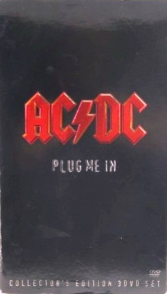 Image of Front Cover of 4434021E: 3xDVD - AC/DC, Plug Me In (Columbia; 88697 14301 9, US 2007, Outer Card Sleeve, Box Set, Poster, Memorabilia, New Liner Notes and Unseen Photos.) A few light marks on discs. Light wear to O-Card.  VG/VG