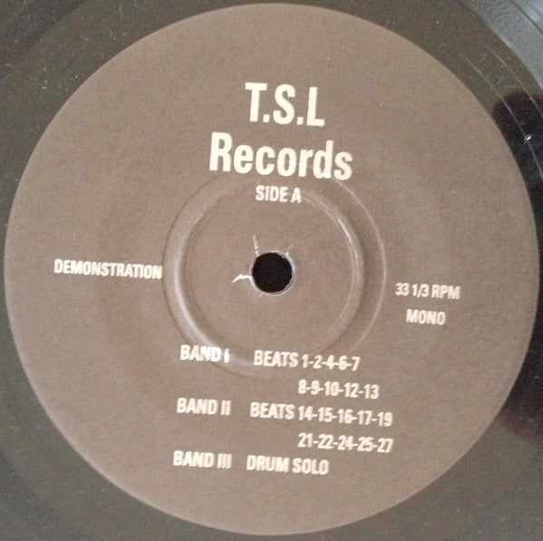Image of Front Cover of 4424091E: 7" EP - VARIOUS, T.S.L Records Demonstration (T.S.L Records; none, US 2002, Plain Sleeve) Vinyl is fogged. Plays with some light background noise.  /G+
