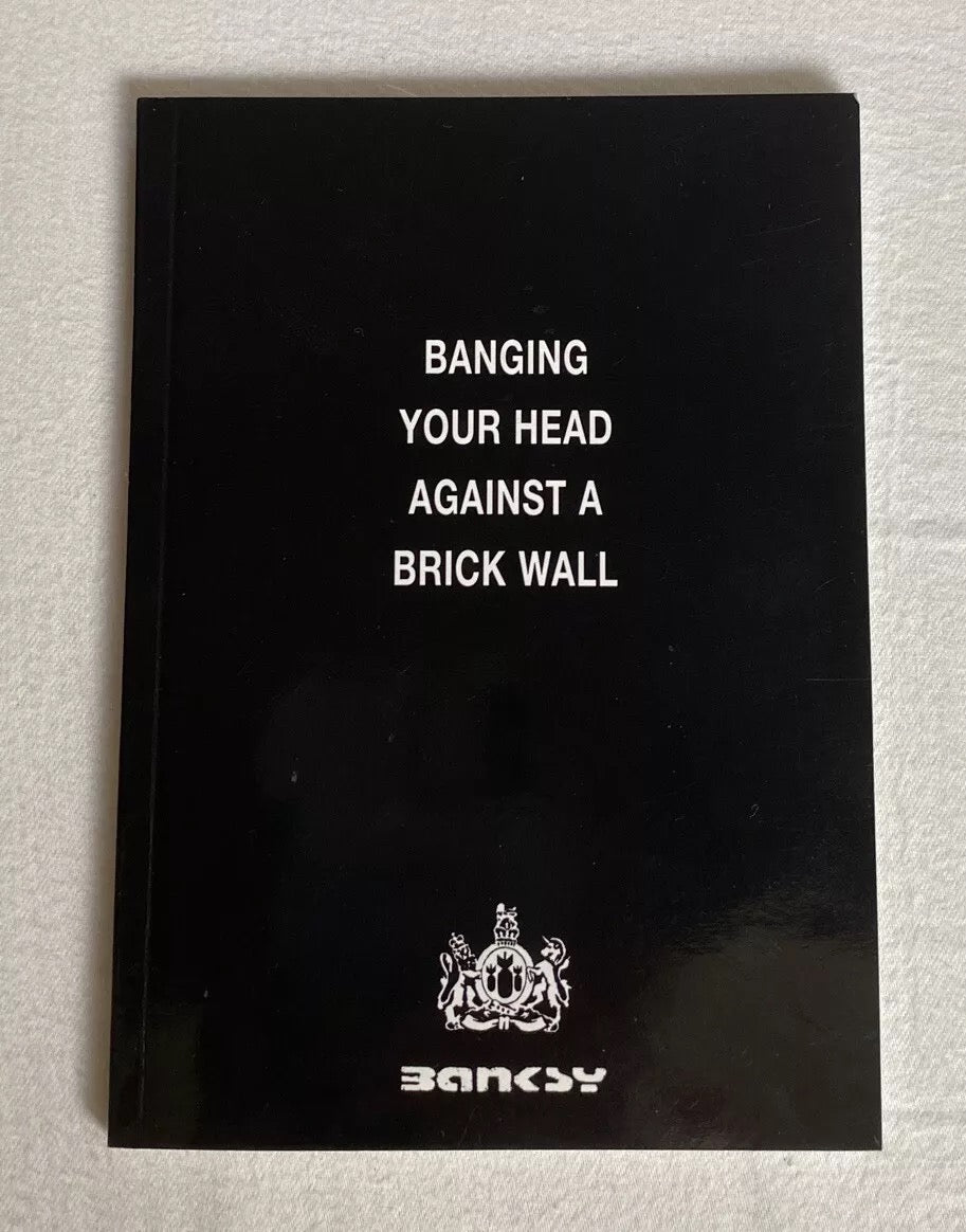 Image of Front Cover of 4634098E: Book - ROBIN BANSKY, Banging Your Head Against a Brick Wall (Weapons of Mass Destruction; 9780954170400, USUK 2001, Paperback)   VG+/VG+