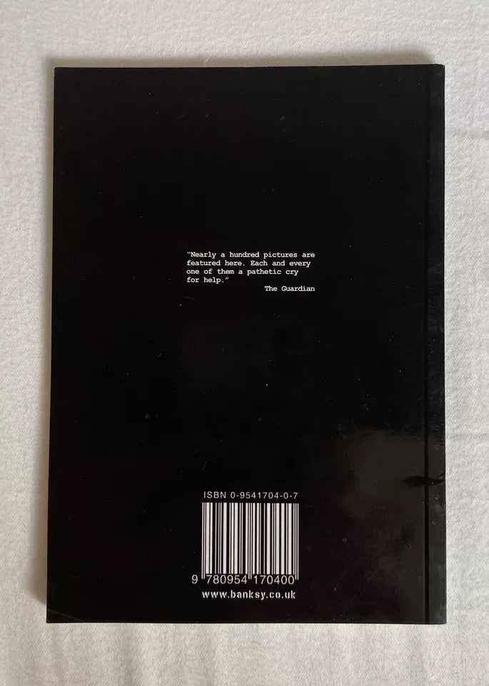 Image of Back Cover of 4634098E: Book - ROBIN BANSKY, Banging Your Head Against a Brick Wall (Weapons of Mass Destruction; 9780954170400, USUK 2001, Paperback)   VG+/VG+