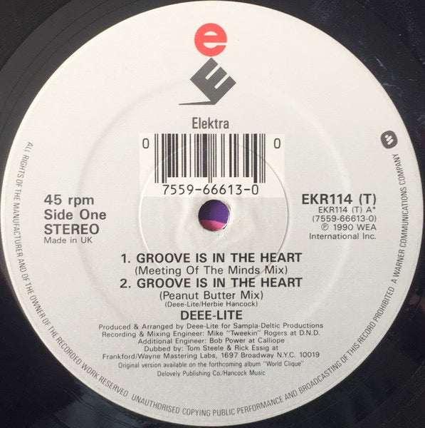 Image of Label Cover of 4614170C: 12" - DEEE-LITE, Groove Is In The Heart (Elektra; EKR 114T, UK 1990, Picture Sleeve, Cat Number In White Box On Sleeve) Sleeve has a very small patch of sticker damage but is otherwise very nice. Lightest of marks to disc.  VG/VG+