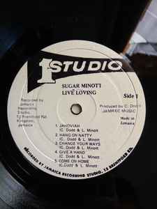 Image of Label Cover of LP - VG+/VG - SUGAR MINOTT, Live Loving (Studio One; PSOL 001, Jamaica 1990s Reissue, Glossy Sleeve), Light pressing dents. Light visual marks. One press flaw on B4 causes a few ticks. Good looking sleeve.,  - 3116067C