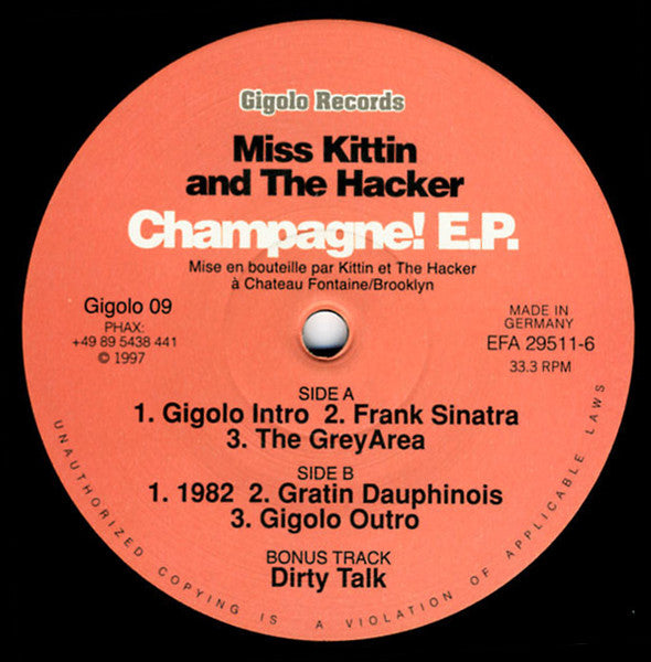 Image of Front Cover of 12" - G+/VG+ - MISS KITTIN AND THE HACKER*, Champagne! E.P. (International Deejay Gigolo Records; Gigolo 11, Germany 1997, Company Sleeve), original purple company sleeve. pen on sleeve. one or two faint scuffs - still VG+,  - 3946048S