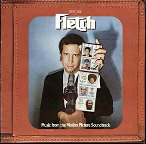 Image of Front Cover of 4914014C: LP - VARIOUS, Music From The Motion Picture Soundtrack "Fletch" (MCA Soundtracks; MCF 3284, UK 1985) Glossy clean vinyl, Sleeve has some light sticker damage  VG/VG+