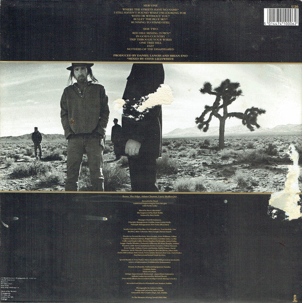 Image of Back Cover of LP - VG/VG - U2, The Joshua Tree (Island Records; U26, UK 1987, Gatefold, Insert, PRS Ltd. Pressing), Creasing, light water mark inside gatefold.  One feelable mark, hairlines otherwise. ,  - 4326406E