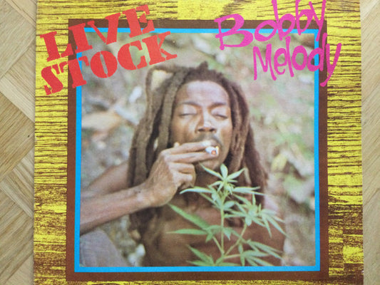 Image of Front Cover of 4944252S: LP - BOBBY MELODY, Live Stock (Harry J. Records Inc.; none, Jamaica 1985) Edge and Ring Wear  VG/VG