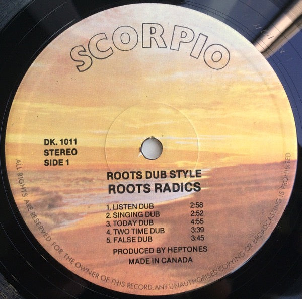 Image of Front Cover of 4914577C: LP - ROOTS RADICS, Roots Dub Style (Scorpio; DK 1011, Canada 1982, No Sleeve) Writing and tears to label. Lots of light marks to disc but plays okay with minimal surface noise.  /G