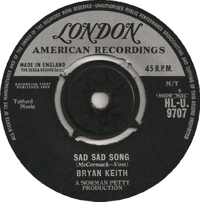 Image of Front Cover of 5014264C: 7" - BRYAN KEITH, Sad Sad Song (London American Recordings; HLU 9707, UK 1963, Company Sleeve, Keith McCormack Of The String-A-Longs) Strong VG  VG/VG