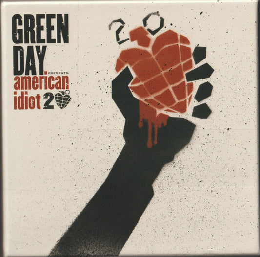 Image of Front Cover of 4xCD - M/M - GREEN DAY, American Idiot 20 (Reprise Records ; 093624862680, US 2024, Box Set, sealed), , The Super Deluxe Limited Edition comes with 4xCD 2xBlu-rayThe box-set also contains a 48-page book, an enamel pin set, sticker sheet, and cloth patch. - 0936149E