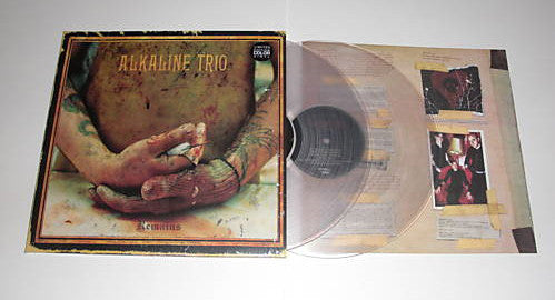 Image of Back Cover of 0145054S: 2xLP - ALKALINE TRIO, Remains (Cobraside Distribution Inc.; CSDLP 1111, US 2007, Gatefold, Insert, Clear Vinyl) Nice clean copy.   VG+/VG+