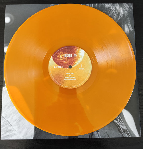 Image of Label Cover of 2xLP - NEW/NEW - JOHNNY MARR, Look Out Live! (New Voodoo / BMG; 964142870, UK 2025, Gatefold, Orange Vinyl), , Look Out Live! perfectly encapsulates the magic of Johnny Marr s sold-out show at the Hammersmith Apollo, London in 2024. The night was a culmination of his 2024 Spirit Power tour and showcases his 40-year repertoire of distinctive songwriting and the guitar sound that has seen Johnny regarded as the most influential guitarist of his generation. The energy of the night can b