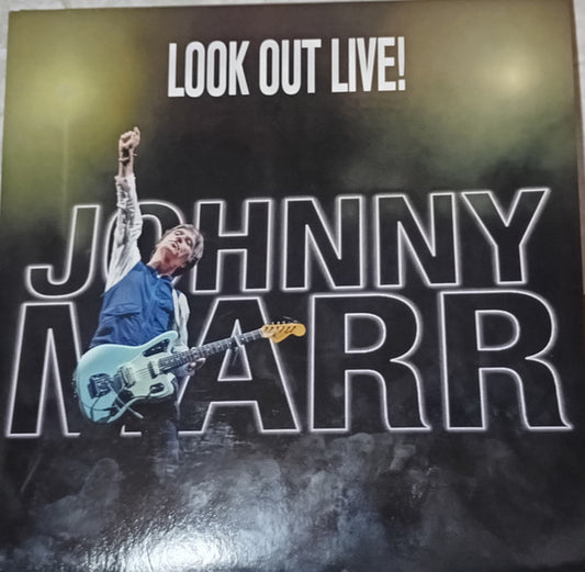 Image of Front Cover of 2xLP - NEW/NEW - JOHNNY MARR, Look Out Live! (New Voodoo / BMG; 964142870, UK 2025, Gatefold, Orange Vinyl), , Look Out Live! perfectly encapsulates the magic of Johnny Marr s sold-out show at the Hammersmith Apollo, London in 2024. The night was a culmination of his 2024 Spirit Power tour and showcases his 40-year repertoire of distinctive songwriting and the guitar sound that has seen Johnny regarded as the most influential guitarist of his generation. The energy of the night can b