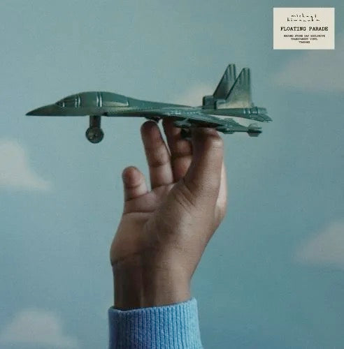 Image of Front Cover of 10" - NEW/NEW - MICHAEL KIWANUKA, Floating Parade (Polydor; 7549983, UK 2025, RSD 2025), , Mercury Prize-winning artist Michael Kiwanuka releases a special limited edition 7  featuring two tracks: a standout from his debut Pyramid Stage performance at Glastonbury, Rule The World with Lianne La Havas, and Floating Parade, the powerful and expansive first release from his critically acclaimed album Small Changes. - 1755085S