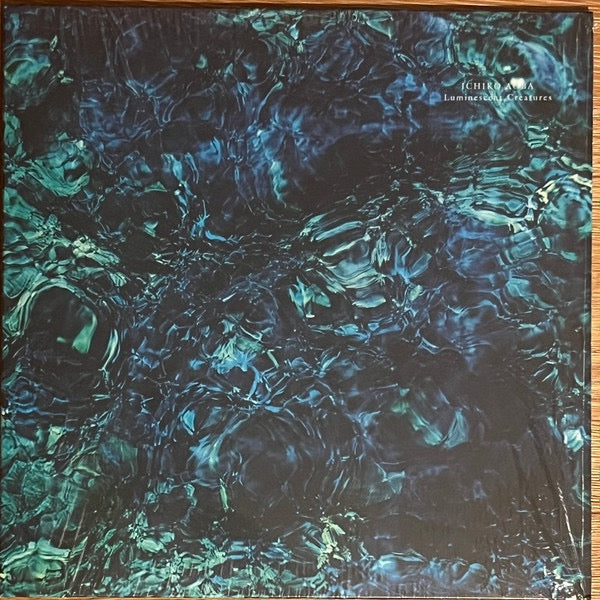 Image of Front Cover of LP - NEW/NEW - ICHIKO AOBA, Luminescent Creatures (Hermine; HERM003LP, Europe 2025, Poster), , To listen to Ichiko Aoba is to be drawn into a world as intimate as a warmly lit home, but cosmic in scale. The Japanese singer, songwriter, composer, and multi-instrumentalist, has taken a dedicated online fanbase built from TikTok sounds and critically acclaimed, and translated that into international tours spanning more than 20 countries. She was well known in Japan collaborating with ar