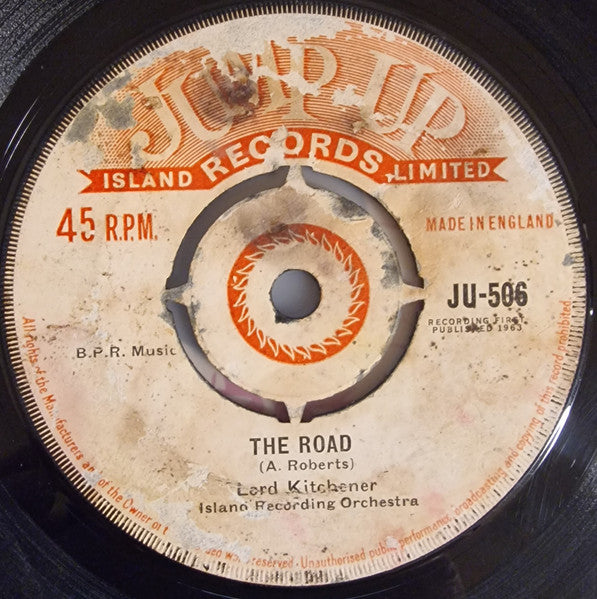 Image of Front Cover of 1215101C: 7" - LORD KITCHENER, ISLAND RECORD ORCHESTRA, The Road / Neighbour (Jump Up; JU 506, UK 1963, 4-Prong Centre) Lots of light marks and scuffs, plays well above grade. Centre intact, SWOL.  /G+