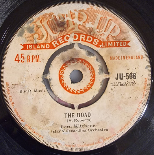 Image of Front Cover of 1215101C: 7" - LORD KITCHENER, ISLAND RECORD ORCHESTRA, The Road / Neighbour (Jump Up; JU 506, UK 1963, 4-Prong Centre) Lots of light marks and scuffs, plays well above grade. Centre intact, SWOL.  /G+