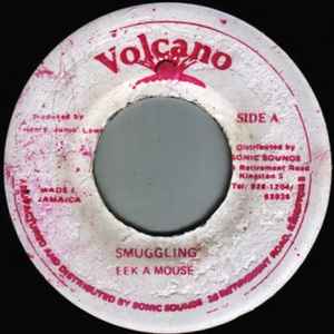 Image of Front Cover of 0216549C: 7" - EEK A MOUSE/ ALTON ELLIS, Smuggling/ Skateland Girl (Version) (Volcano; , Jamaica 1990s Reissue) Fogged from JA press, light background crackle.  /VG