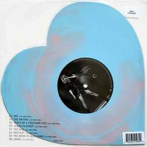 Image of Back Cover of 2x10" - VG+/VG+ - TAYLOR SWIFT, Lover (Live From Paris) (Republic Records ; B0036417-01, USA & Europe 2025 Reissue, Stickered Plastic Gatefold Sleeve, 2-heart shaped 8"discs: Pink-In-Yellow Swirl Vinyl and Pink-In-Blue Swirl Vinyl), SEALED,  - 4046025S