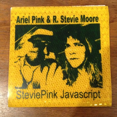 Image of Front Cover of 2355002S: 7" - ARIEL PINK & R. STEVIE MOORE, SteviePink Javascript (People In A Position To Know; PIAPTK-091, US 2012, Fold Over Silkscreened Holographic Honeycomb Sleeve, Insert, Lathe Cut on Mirror. Single Sided. Second Edition. 51/66 Hand Numbered. Sleeve Variant, Green Ink on Yellow Holographic Sleeve.) A few light marks on mirror.  VG+/VG