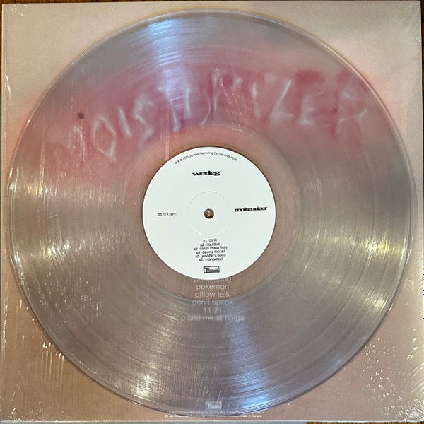 Image of Label Cover of LP - NEW/NEW - WET LEG, moisturizer (Domino; WIGLP530X, Worldwide 2025, Inner & Insert, Download, Clear Vinyl, Indie Exclusive), , moisturizer is the bold, second album from Wet Leg, the Isle of Wight five-piece founded by Rhian Teasdale and Hester Chambers. Joined by Ellis Durand, Henry Holmes, and Joshua Mobaraki, Wet Leg has spent the past few years on the road, evolving into a feral, electrifying live force. This new record captures that energy, delivering a sound that s tighter,