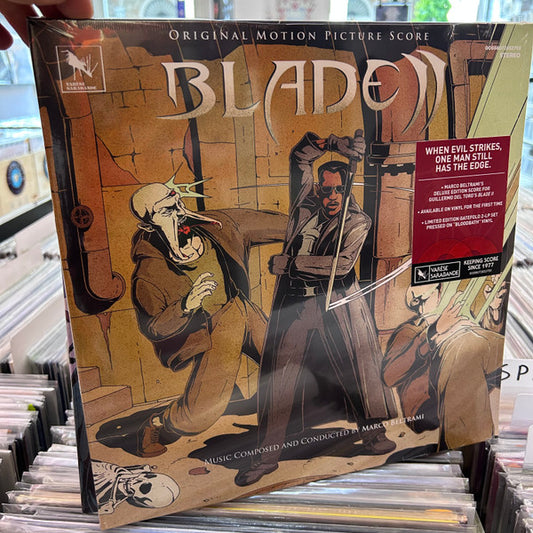 Image of Front Cover of 2725057E: LP - MARCO BELTRAMI, Blade II (Original Motion Picture Score) (Var�se Sarabande; 00888072652705, Europe 2025, Gatefold, Transparent Red vinyl)   VG+/VG+
