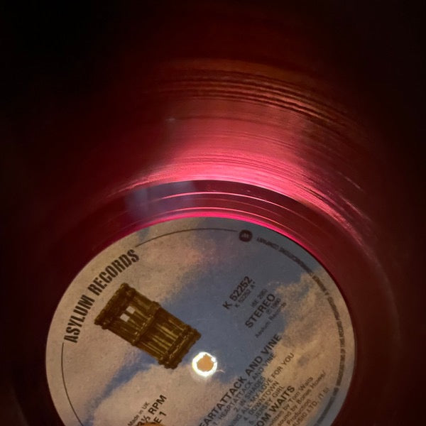 Image of Label Cover of LP - VG+/VG - TOM WAITS, Heartattack And Vine (Asylum Records; K 52252, UK 1980, Inner, Translucent Purple vinyl), , Listed as a misprint on Discogs but nothing is misprinted. Also listed as 'dark brown' when it's translucent purple. Light hairlines and very light edgewear. - 2226039E