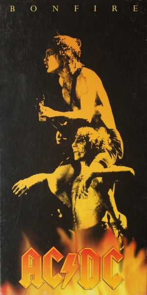 Image of Front Cover of 3135105E: 4xCD - AC/DC, Bonfire (EastWest; 7559-62162-2, Europe 1997, Box Set, Booklet, Booklet, double sided poster, guitar pick, key-chain bottle opener, sticker and temporary tattoo.) Temporary tattoo is stuck on gruitar pick   VG+/VG+