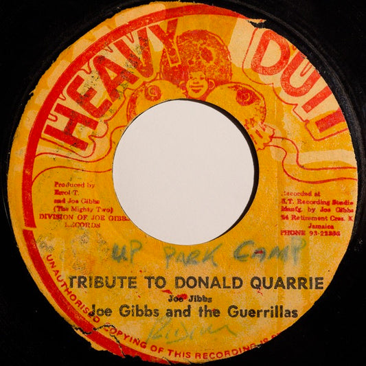 Image of Front Cover of 3215232C: 7" - JOE GIBBS & THE GUERRILLAS, Tribute To Donald Quarrie (Heavy Duty; , Jamaica 1970s) Very strong VG, sounds EX.  /VG