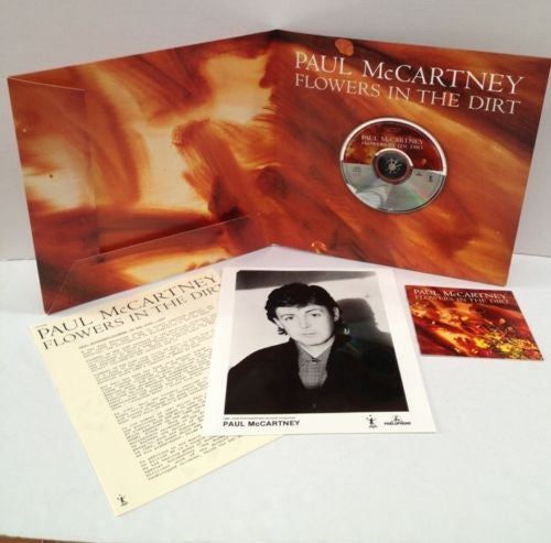 Image of Back Cover of 3355021S: CD - PAUL MCCARTNEY, Flowers In The Dirt (Parlophone; CDP 7 91653 2, UK 1989, Standard UK CD but housed in a 10" gatefold sleeve, containing a 4 page stapled A4 career biography from parlophone and a 10 page stapled A4 description of the album tracks from Paul. All on special watermarked textured paper. Also includes 3 promotional photographs.) CD has light scracthes, rest of media and sleeve in great condition  VG+/G+