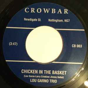 Image of Back Cover of 3325118E: 7" - LOU GARNO TRIO, Muy Sabroso / Chicken In The Basket (Crowbar Records; CB003, UK 2005) Some marks on vinyl but plays well.  /VG