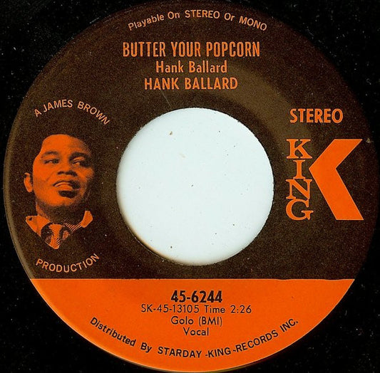 Image of Front Cover of 7" - VG/VG - HANK BALLARD, Butter Your Popcorn / Funky Soul Train (King Records; 45-6244, US 1969, Company Sleeve), Record has light fogging around rim. Sleeve worn, creased and discoloured. Labels worn with drill hole,  - 3915331C
