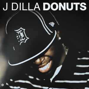 Image of Front Cover of 2xLP - VG+/VG+ - J DILLA, Donuts (Stones Throw Records; STH2126, US Reissue, Smile cover), A couple of light hairlines only. ,  - 4126322E