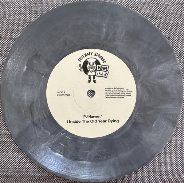 Image of Label Cover of 5015087C: 7" - PJ HARVEY, Live At L'Olympia Paris (Friendly Recordings ; FRWC7003, UK 2024, Picture Sleeve, Limited To 900 On Grey Marbled Vinyl)   EX/EX