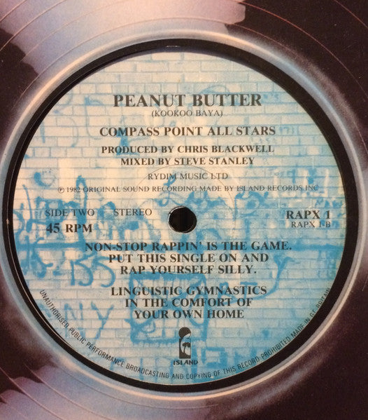 Image of Label Cover of 0446066S: LP - TOM TOM CLUB / COMPASS POINT ALL STARS, Rappa Rappa Rhythm / Peanut Butter (Island Records; RAPX 1, UK 1982, Die Cut Company Sleeve) Hairlines and scuffs, edge wear  VG/G+
