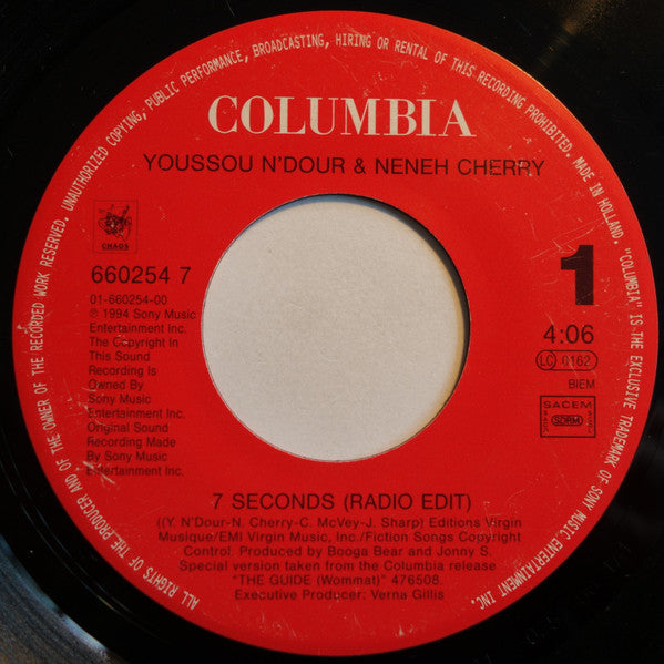 Image of Front Cover of 4425121E: 7" - YOUSSOU N'DOUR & NENEH CHERRY, 7 Seconds / Mame Bamba (Columbia; 660254 7, France 1994) Lightest of marks.  /VG+