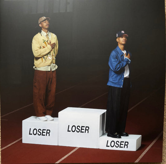 Image of Front Cover of 4525274E: LP - RIZZLE KICKS, Competition Is For Losers (BMG; 964134541, Worldwide 2025, Gatefold, Inner, Poster, Gold Vinyl) Seal opened instore. Still in hype stickered shrinkwrap.   EX/EX