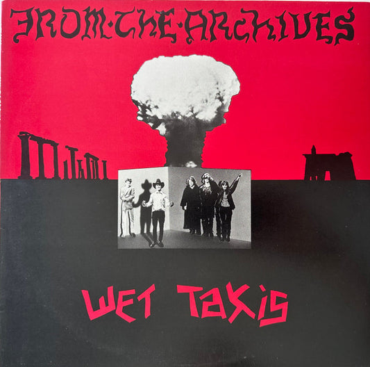 Image of Front Cover of 4825171E: LP - WET TAXIS, From The Archives (Hot Records; HOT 1012, Australia 1984, Insert) Ring and edge wear, promo sticker stuck on sleeve opening.  Disc in great condition.    G+/VG+