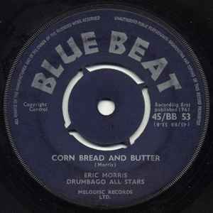 Image of Back Cover of 4955246S: 7" - ERIC MORRIS, DRUMBAGO ALL STARS, Humpty Dumpty / Corn Bread And Butter (Blue Beat; 45/BB 53, UK 1961, 4 prong centre.) Marks on disc.  /G+