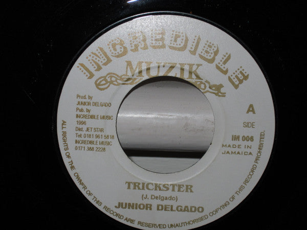 Image of Front Cover of 4915515C: 7" - JUNIOR DELGADO, Trickster (Incredible Muzik; IM 005, Jamaica 1996 Reissue) Lots of light marks, plays fine.  /VG