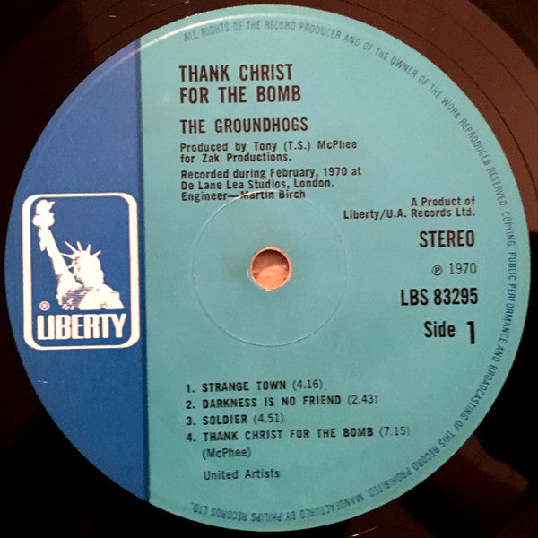 Image of Label Cover of 0426174E: LP - GROUNDHOGS, Thank Christ For The Bomb (Liberty; LBS 83295, UK 1970, Textured Gatefold Sleeve, Blue Labels) Surface noise. Scuffs and hairlines. Edge wear, very heavy to spine, sticker damage on back of sleeve, heavy staining, water damage, tears.  G/G+